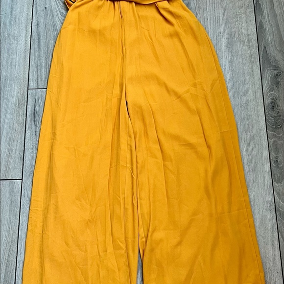 Mustard color cold shoulder jumpsuit in size small - Picture 2 of 2